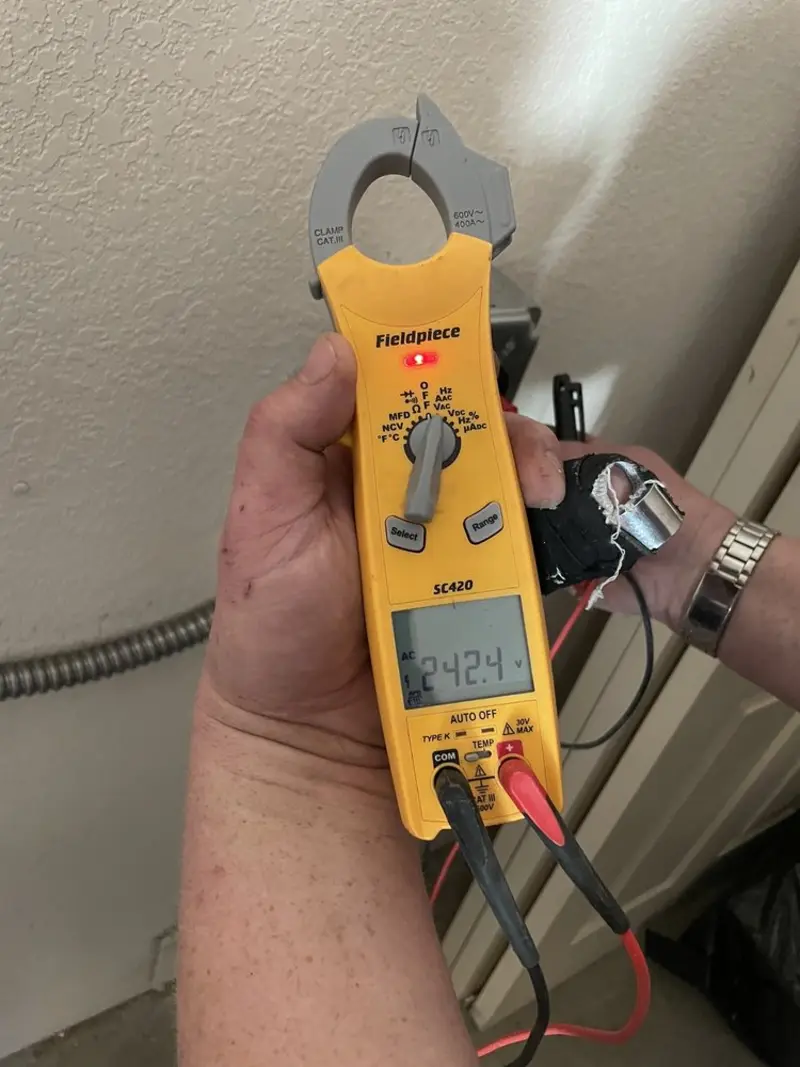Voltage testing with clamp meter during Ceiling Fan Installation in Idyllwild-Pine Cove